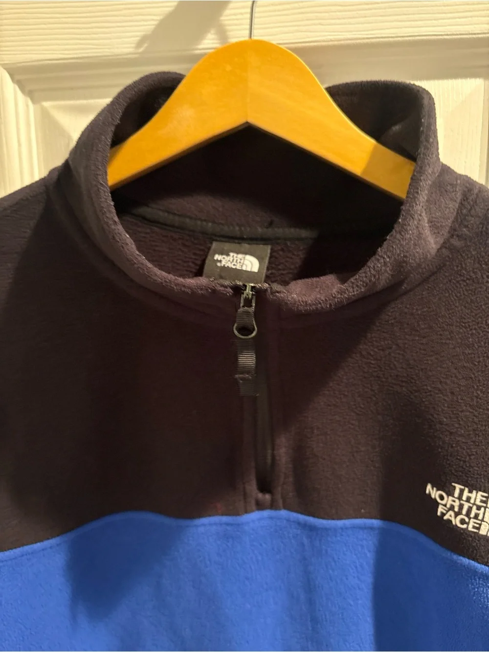 The North Face Black and Blue Fleece 1/4 zip Pullover